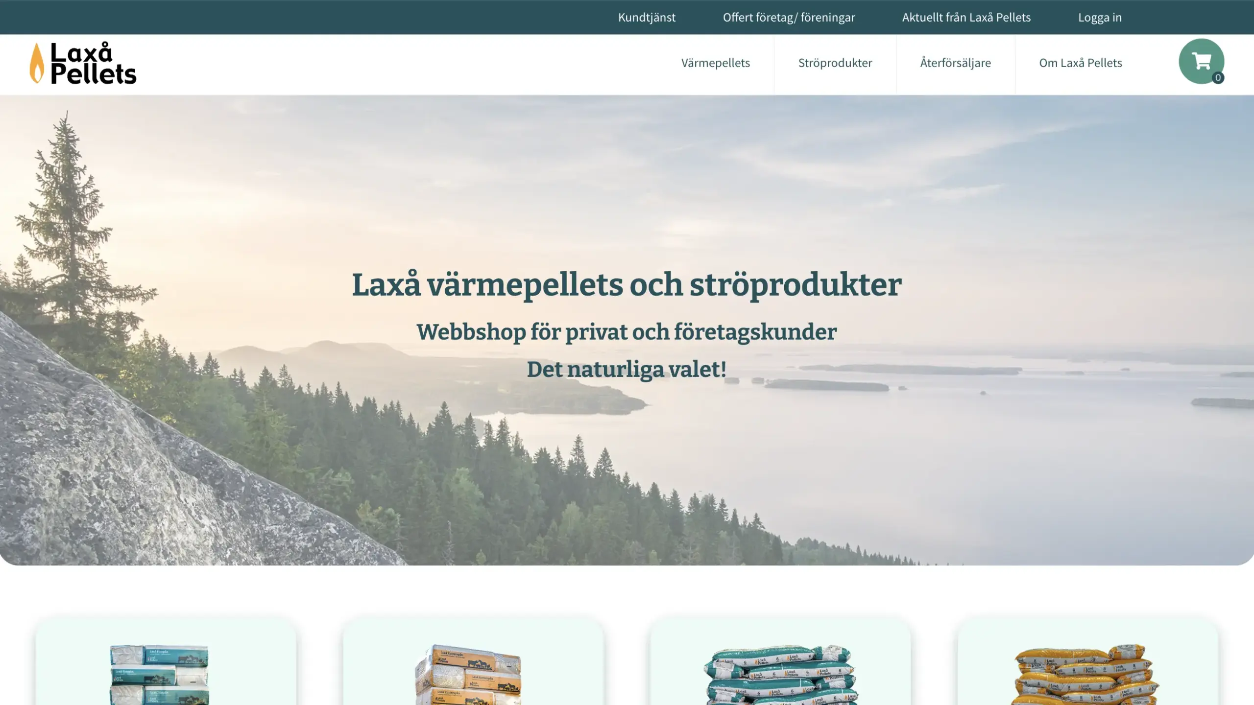 Skärmbild över startsidan på Laxå Pellets. En harmonisk bild som bakgrund med berg och vatten, mjuk övertoning och text.